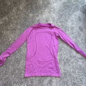 Lululemon size 6 long sleeve shirt. Perfect condition.